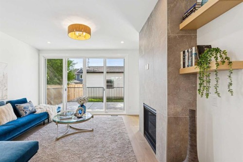 1527 29 Avenue Sw, Calgary, AB - Indoor Photo Showing Living Room With Fireplace