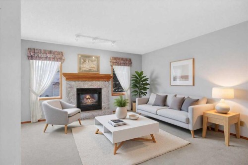531 Sierra Morena Court Sw, Calgary, AB - Indoor Photo Showing Living Room With Fireplace