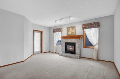 531 Sierra Morena Court Sw, Calgary, AB - Indoor With Fireplace