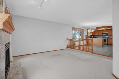 531 Sierra Morena Court Sw, Calgary, AB - Indoor Photo Showing Other Room With Fireplace