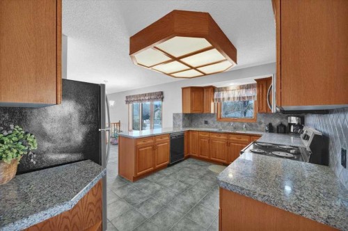 531 Sierra Morena Court Sw, Calgary, AB - Indoor Photo Showing Kitchen With Double Sink