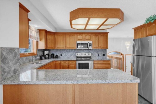 531 Sierra Morena Court Sw, Calgary, AB - Indoor Photo Showing Kitchen With Double Sink