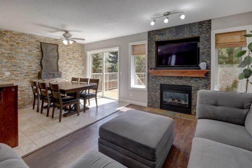 15 Parklane Drive, Strathmore, AB - Indoor Photo Showing Living Room With Fireplace