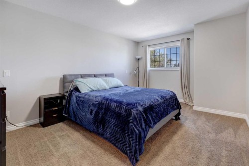 15 Parklane Drive, Strathmore, AB - Indoor Photo Showing Bedroom