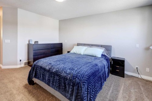 15 Parklane Drive, Strathmore, AB - Indoor Photo Showing Bedroom