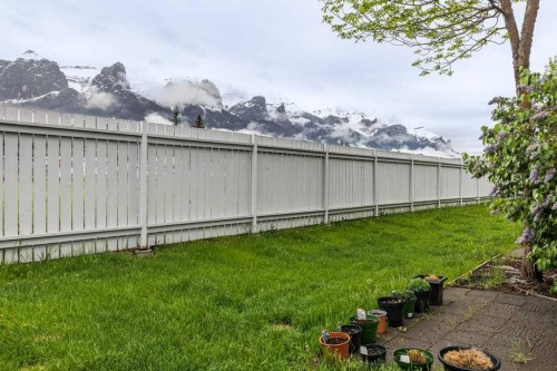 111-1206 Bow Valley Trail, Canmore, AB - Outdoor With Backyard