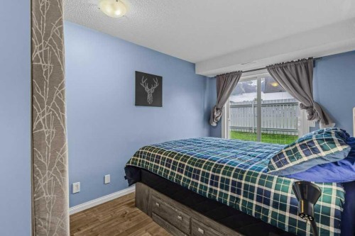 111-1206 Bow Valley Trail, Canmore, AB - Indoor Photo Showing Bedroom