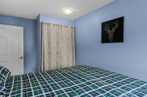 111-1206 Bow Valley Trail, Canmore, AB - Indoor Photo Showing Bedroom