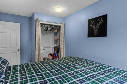 111-1206 Bow Valley Trail, Canmore, AB - Indoor Photo Showing Bedroom