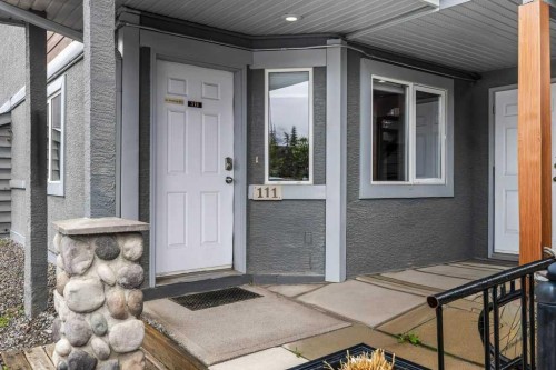 111-1206 Bow Valley Trail, Canmore, AB - Outdoor With Deck Patio Veranda With Exterior