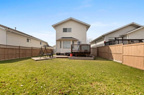 48 Sunridge Crescent Nw, Airdrie, AB - Outdoor With Deck Patio Veranda