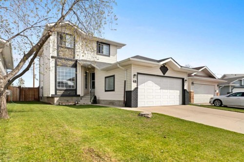 48 Sunridge Crescent Nw, Airdrie, AB - Outdoor With Facade