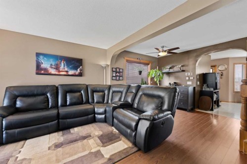 48 Sunridge Crescent Nw, Airdrie, AB - Indoor Photo Showing Living Room