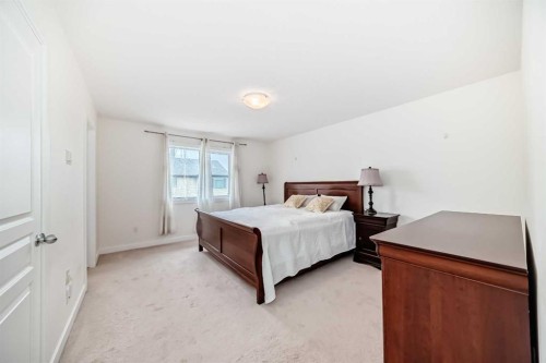 79 Cranford Green Se, Calgary, AB - Indoor Photo Showing Bedroom
