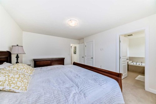 79 Cranford Green Se, Calgary, AB - Indoor Photo Showing Bedroom