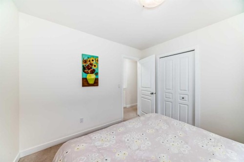 79 Cranford Green Se, Calgary, AB - Indoor Photo Showing Bedroom