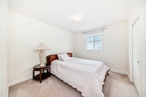 79 Cranford Green Se, Calgary, AB - Indoor Photo Showing Bedroom
