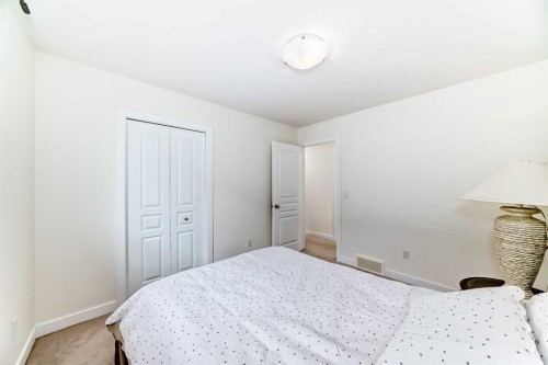 79 Cranford Green Se, Calgary, AB - Indoor Photo Showing Bedroom