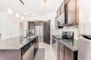79 Cranford Green Se, Calgary, AB  - Indoor Photo Showing Kitchen With Stainless Steel Kitchen With Double Sink With Upgraded Kitchen 