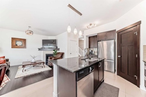 79 Cranford Green Se, Calgary, AB - Indoor Photo Showing Kitchen With Stainless Steel Kitchen With Double Sink