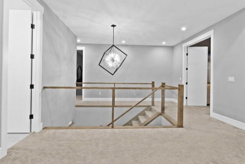 247 Kinniburgh Place, Chestermere, AB - Indoor Photo Showing Other Room