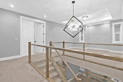 247 Kinniburgh Place, Chestermere, AB - Indoor Photo Showing Other Room