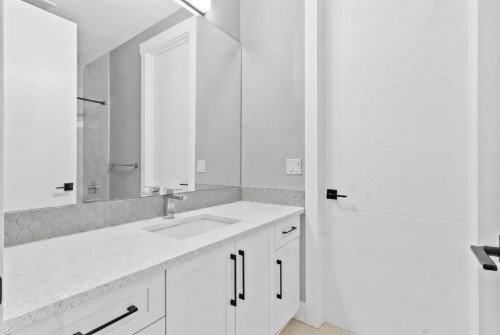 247 Kinniburgh Place, Chestermere, AB - Indoor Photo Showing Bathroom