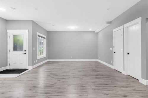 247 Kinniburgh Place, Chestermere, AB - Indoor Photo Showing Other Room