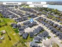 247 Kinniburgh Place, Chestermere, AB  -  With Body Of Water With View 