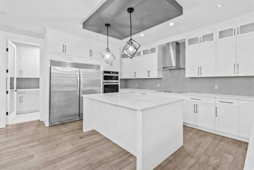 247 Kinniburgh Place, Chestermere, AB - Indoor Photo Showing Kitchen With Upgraded Kitchen