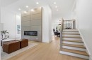60 Lake Lucerne Close Se, Calgary, AB  - Indoor Photo Showing Other Room With Fireplace 