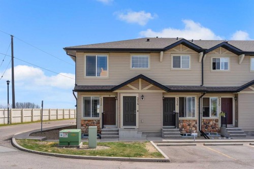 312 Saddlebrook Point Ne, Calgary, AB - Outdoor With Facade