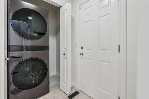 22 Sherwood Cove Nw, Calgary, AB - Indoor Photo Showing Laundry Room