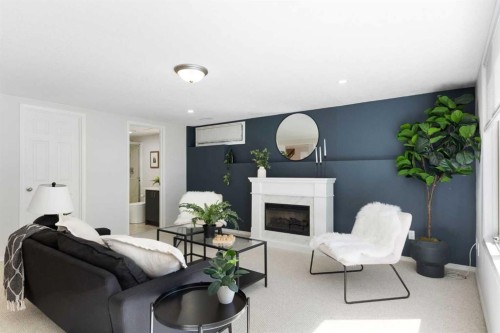 136 Schubert Hill Nw, Calgary, AB - Indoor With Fireplace