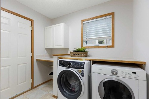 136 Schubert Hill Nw, Calgary, AB - Indoor Photo Showing Laundry Room