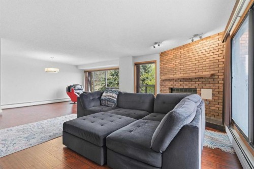 805-320 Meredith Road Ne, Calgary, AB - Indoor Photo Showing Living Room With Fireplace