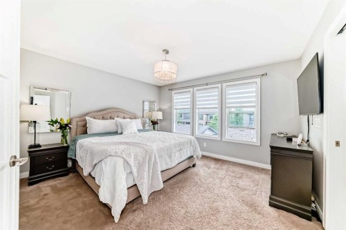 246 Cooperswood Green Sw, Airdrie, AB - Indoor Photo Showing Bedroom