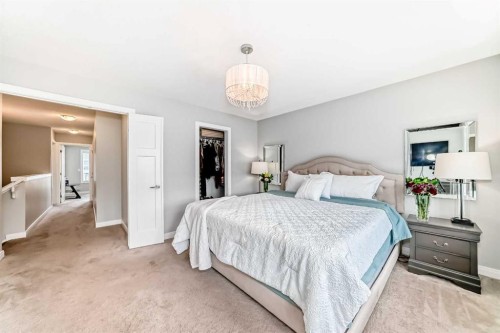 246 Cooperswood Green Sw, Airdrie, AB - Indoor Photo Showing Bedroom