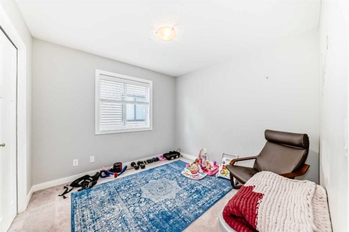246 Cooperswood Green Sw, Airdrie, AB - Indoor Photo Showing Bedroom