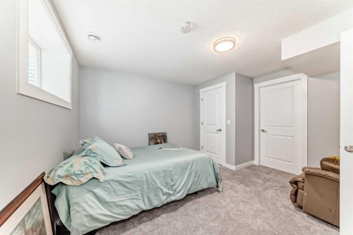 246 Cooperswood Green Sw, Airdrie, AB - Indoor Photo Showing Bedroom