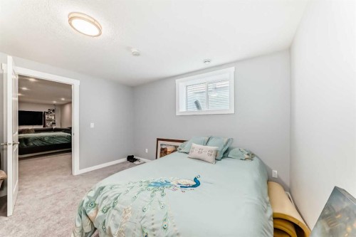 246 Cooperswood Green Sw, Airdrie, AB - Indoor Photo Showing Bedroom