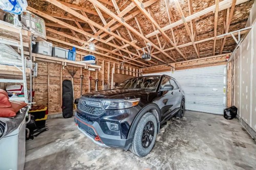 246 Cooperswood Green Sw, Airdrie, AB - Indoor Photo Showing Garage