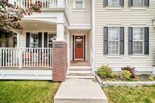 246 Cooperswood Green Sw, Airdrie, AB - Outdoor With Deck Patio Veranda With Facade
