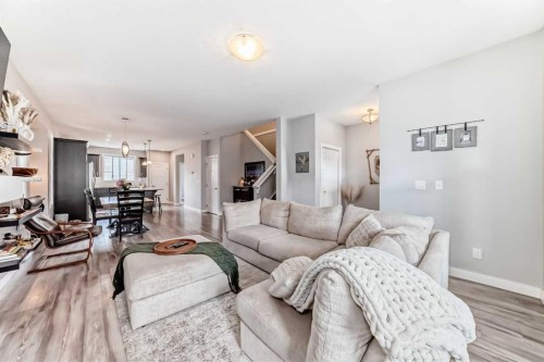 246 Cooperswood Green Sw, Airdrie, AB - Indoor Photo Showing Living Room