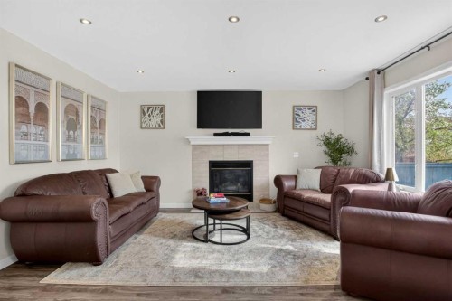 3271 Douglasdale Boulevard Se, Calgary, AB - Indoor Photo Showing Living Room With Fireplace