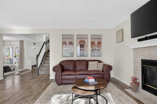 3271 Douglasdale Boulevard Se, Calgary, AB - Indoor Photo Showing Living Room With Fireplace