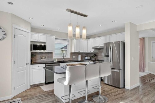 3271 Douglasdale Boulevard Se, Calgary, AB - Indoor Photo Showing Kitchen With Stainless Steel Kitchen With Upgraded Kitchen
