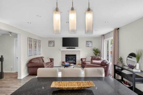 3271 Douglasdale Boulevard Se, Calgary, AB - Indoor Photo Showing Other Room With Fireplace
