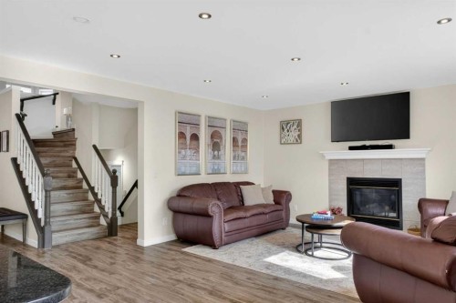 3271 Douglasdale Boulevard Se, Calgary, AB - Indoor Photo Showing Living Room With Fireplace