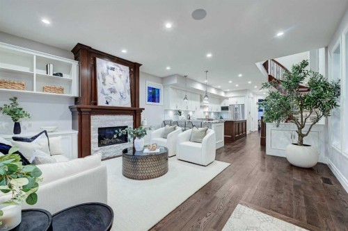 922 5 Street Nw, Calgary, AB - Indoor Photo Showing Living Room With Fireplace